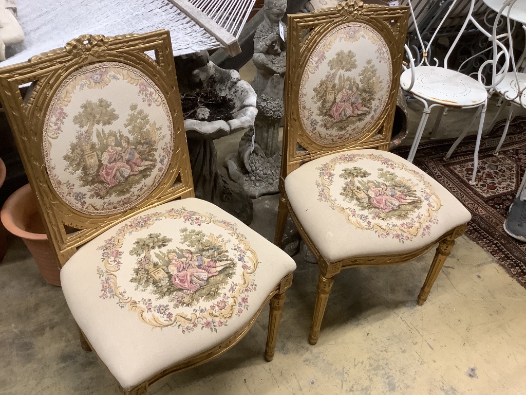 A set of six French giltwood and gesso tapestry back chairs (two with arms)